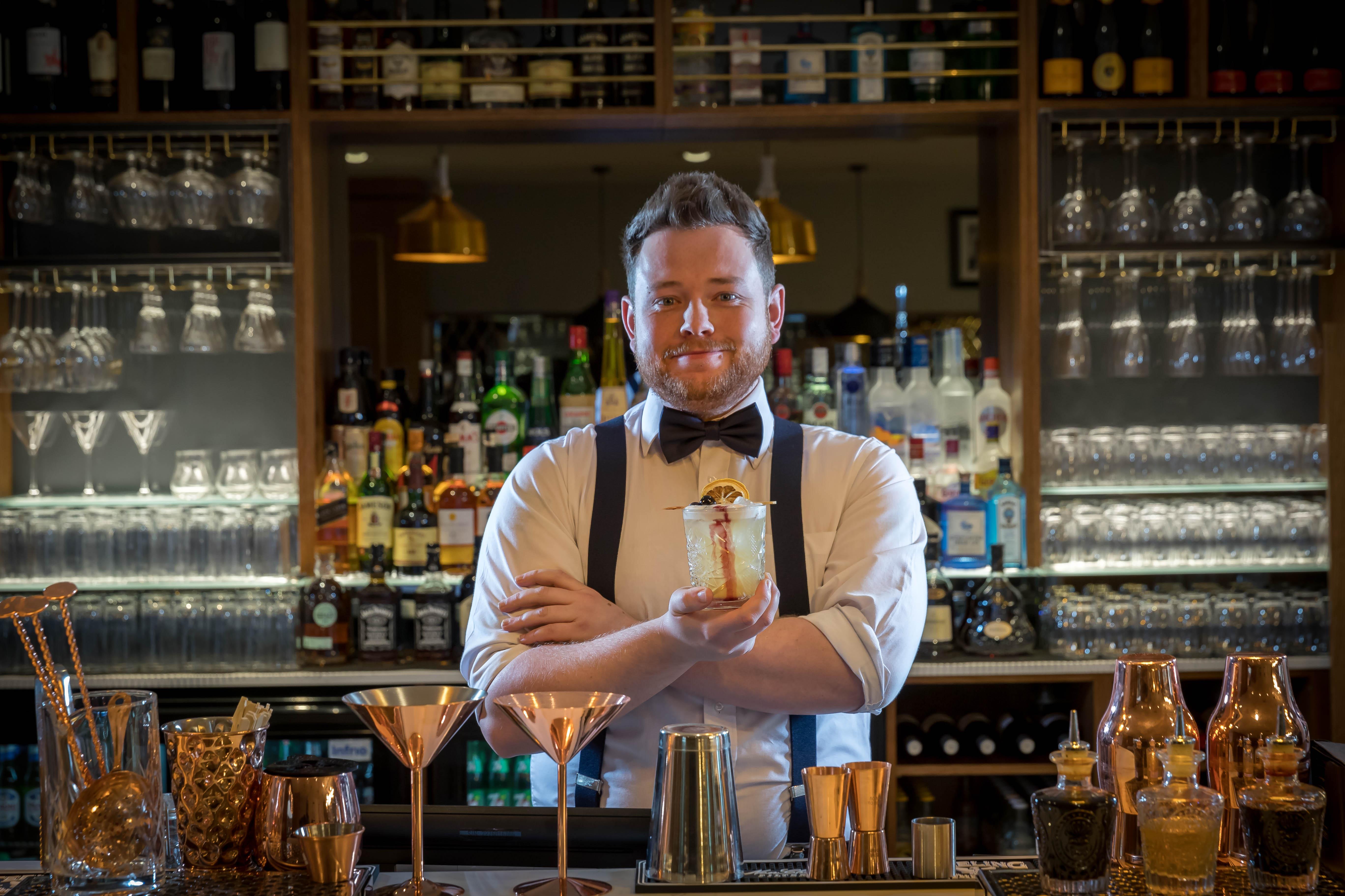 Clayton Hotel Dublin Airport Coolock Esterno foto Bartender with a drink