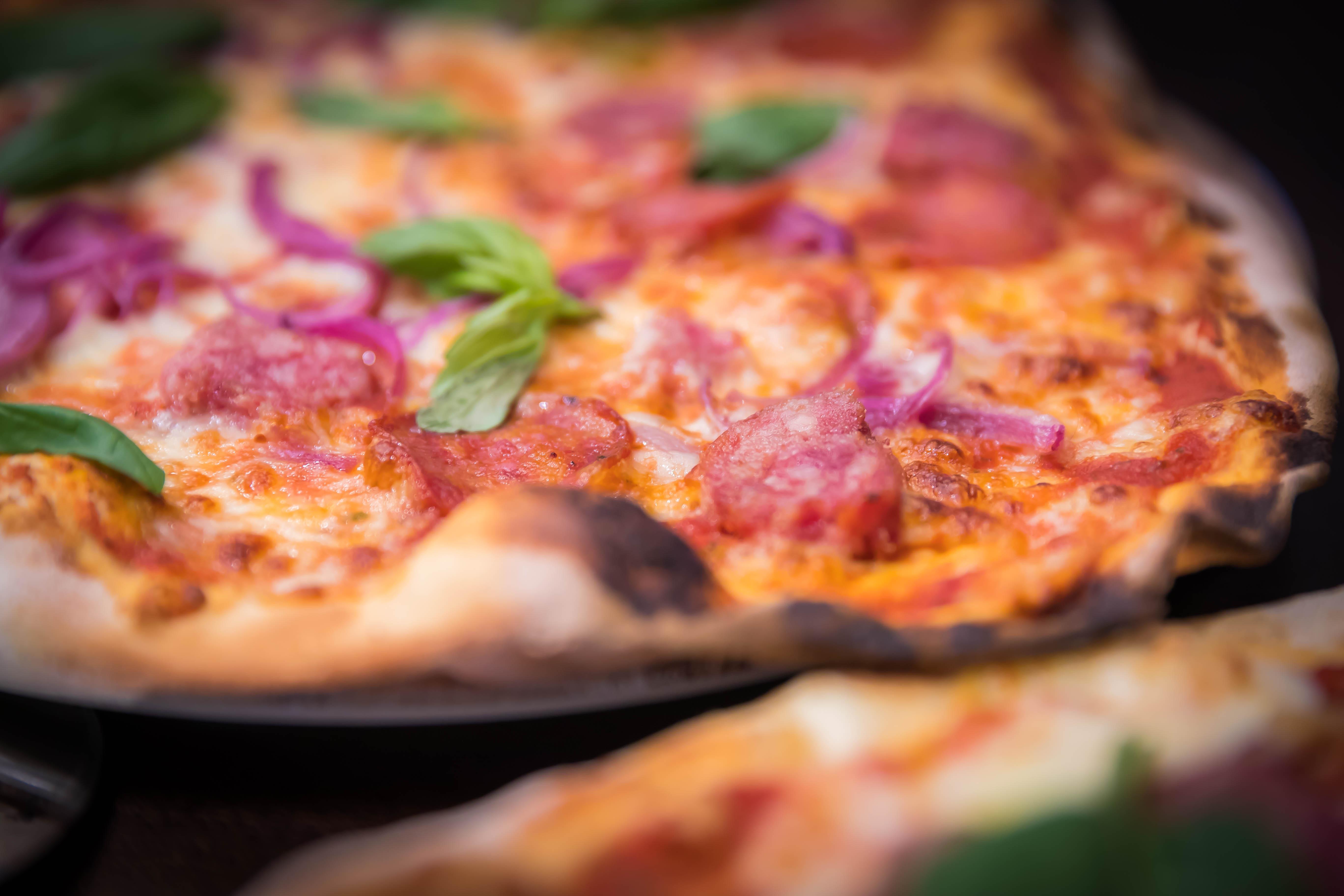 Clayton Hotel Dublin Airport Coolock Esterno foto A pizza with bacon, onion, and red onion